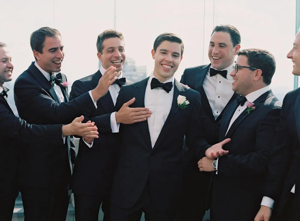 The groom enjoying some time with his friends