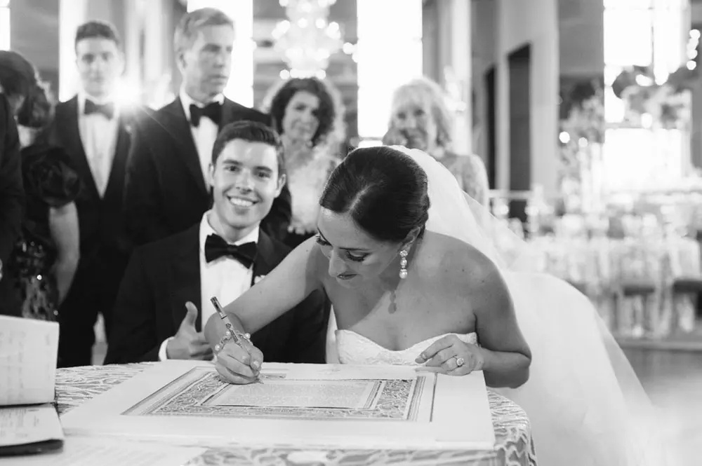 Formalizing the marriage by signing the legal documents