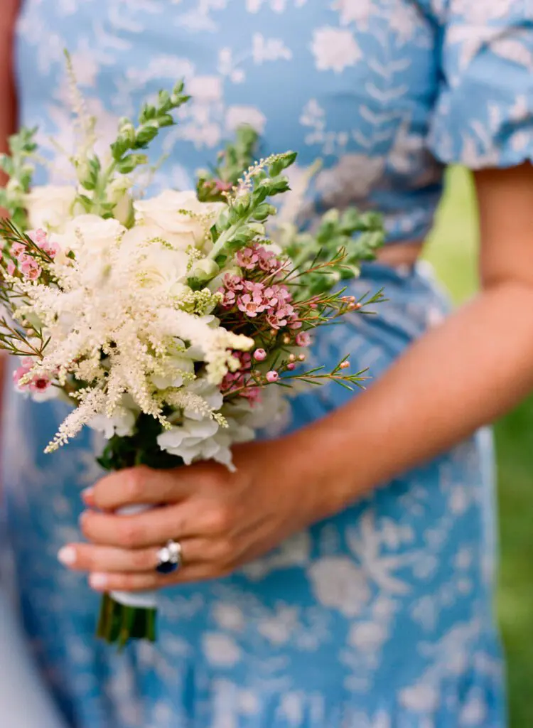 A beautiful bouquet in the hands of a bridesmaid