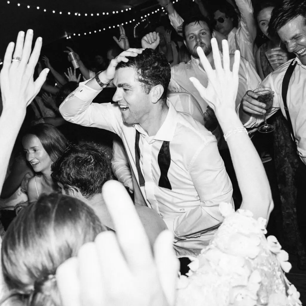 The groom is enjoying every moment during his wedding