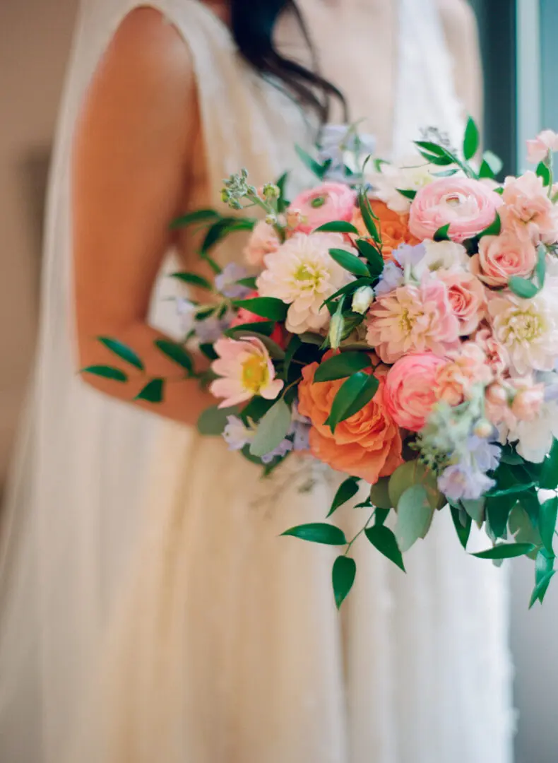 Bride holding a bunch of flowers