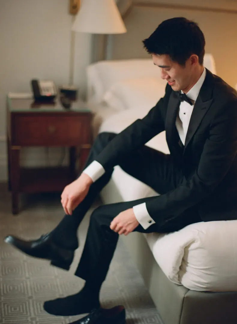 Groom wearing shoes for wedding