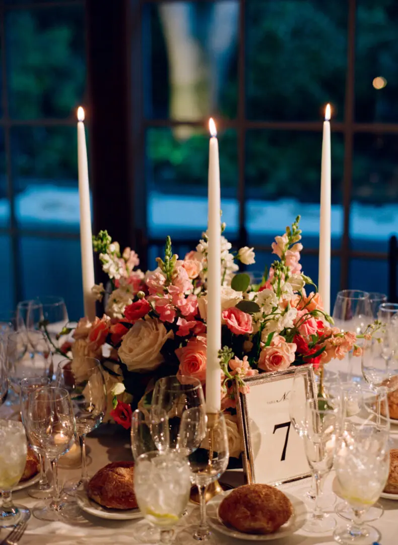Decorated wedding table with food and candles