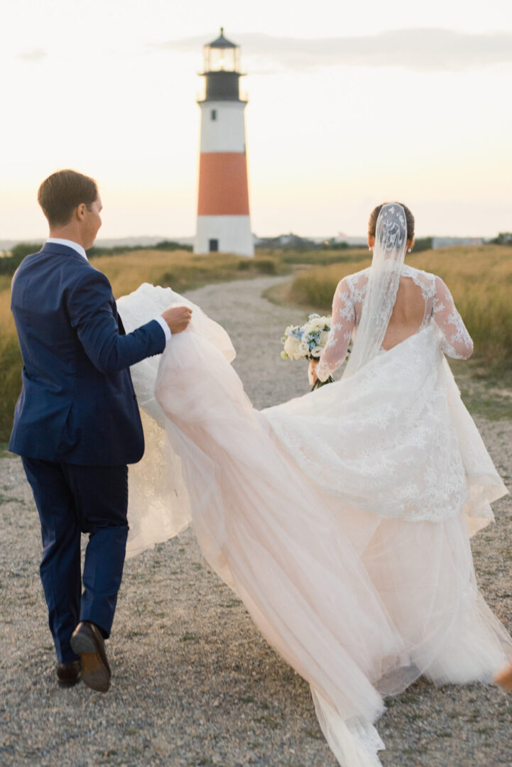 Bride and Groom walking to Lighthouse in Sankaty